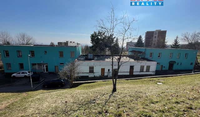 Prodej nájemního domu, činžáku 1 000 m², Přátelství, Litvínov – Janov, okres Most
