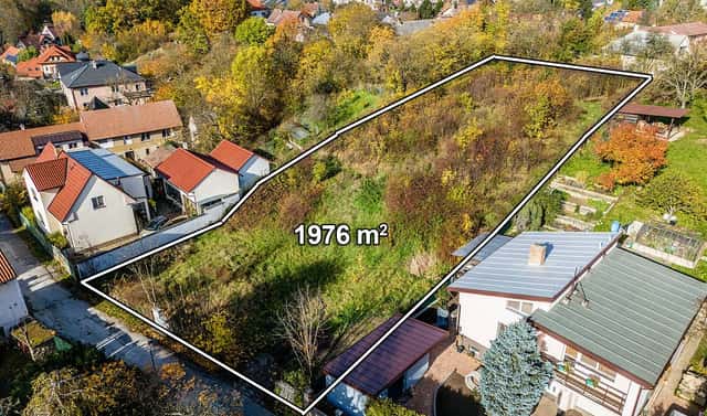 Prodej stavebního pozemku 1 976 m², Praha 9