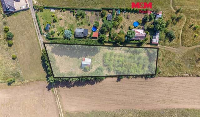 Prodej stavebního pozemku 2 434 m², Křenek, okres Praha-východ