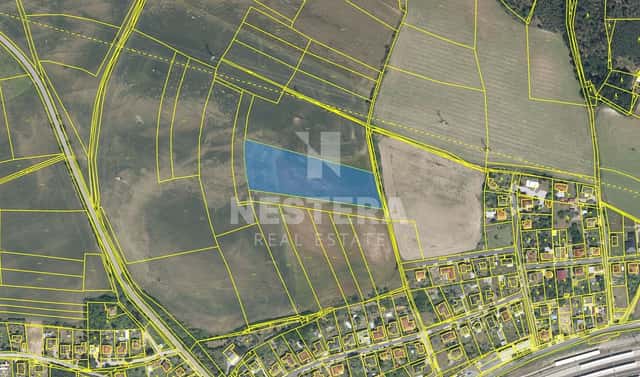 Prodej pole 11 859 m², Poříčany, okres Kolín