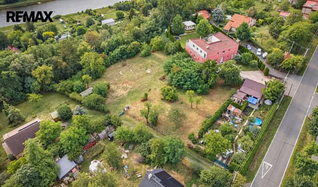 Prodej stavebního pozemku 3 223 m², Husinec, okres Praha-východ