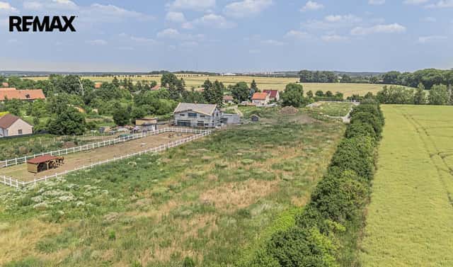 Prodej stavebního pozemku 11 703 m², Sibřina, okres Praha-východ