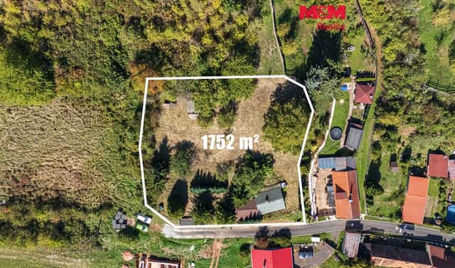 Prodej stavebního pozemku 1 752 m², Pnětluky, okres Louny