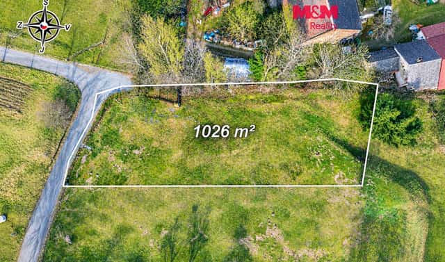 Prodej stavebního pozemku 1 026 m², Popovičky – Chomutovice, okres Praha-východ
