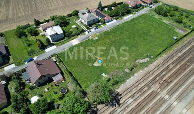 Prodej stavebního pozemku 1 087 m², Dvory, okres Nymburk
