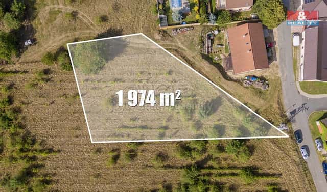Prodej stavebního pozemku 1 974 m², Chrást, okres Nymburk