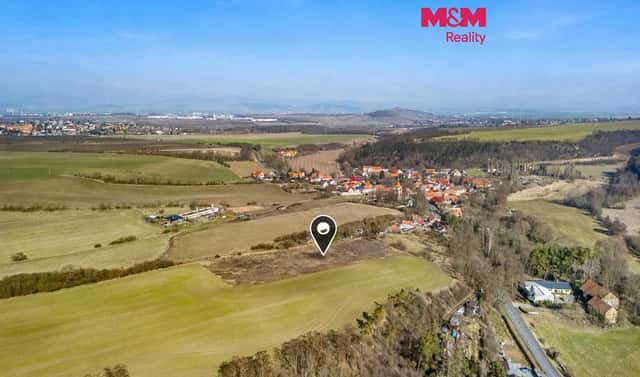 Prodej stavebního pozemku 1 068 m², Louny – Brloh