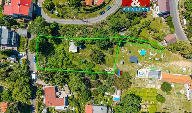 Prodej stavebního pozemku 1 699 m², Most – Souš