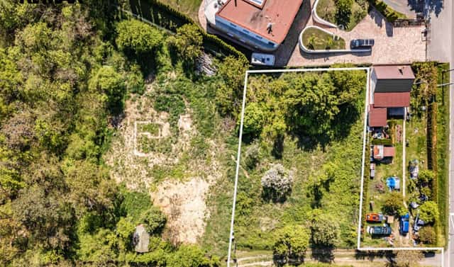 Prodej stavebního pozemku 1 070 m², Husinec, okres Praha-východ