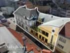 Velký a kompletně pronajatý činžovní dům s byty a nebytovými prostory v centru Kladna, okres Kladno