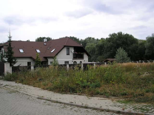Prodej stavebního pozemku 1 083 m², Praha 10 - Dubeč, Praha 10