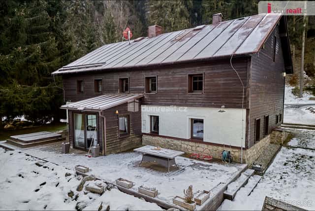 Dům s investiční příležitostí na pozemku 6.666 m2 v Krušných, okres Karlovy Vary
