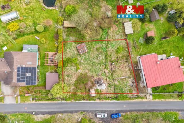 Prodej pozemku k bydlení 671 m2 v Kraslicích, Praha 5